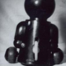 Ours mécanique, dos, tirage, sténopé, 1999.